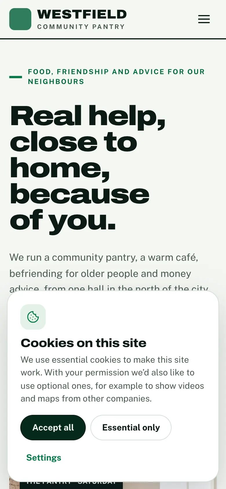 The banner on a phone, taking up the bottom of the screen, with Accept all, Essential only and Settings