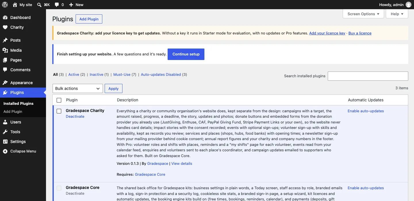 The Installed Plugins list showing Gradespace Charity, "Requires: Gradespace Core", and Gradespace Core, "Required by: Gradespace Charity", both active