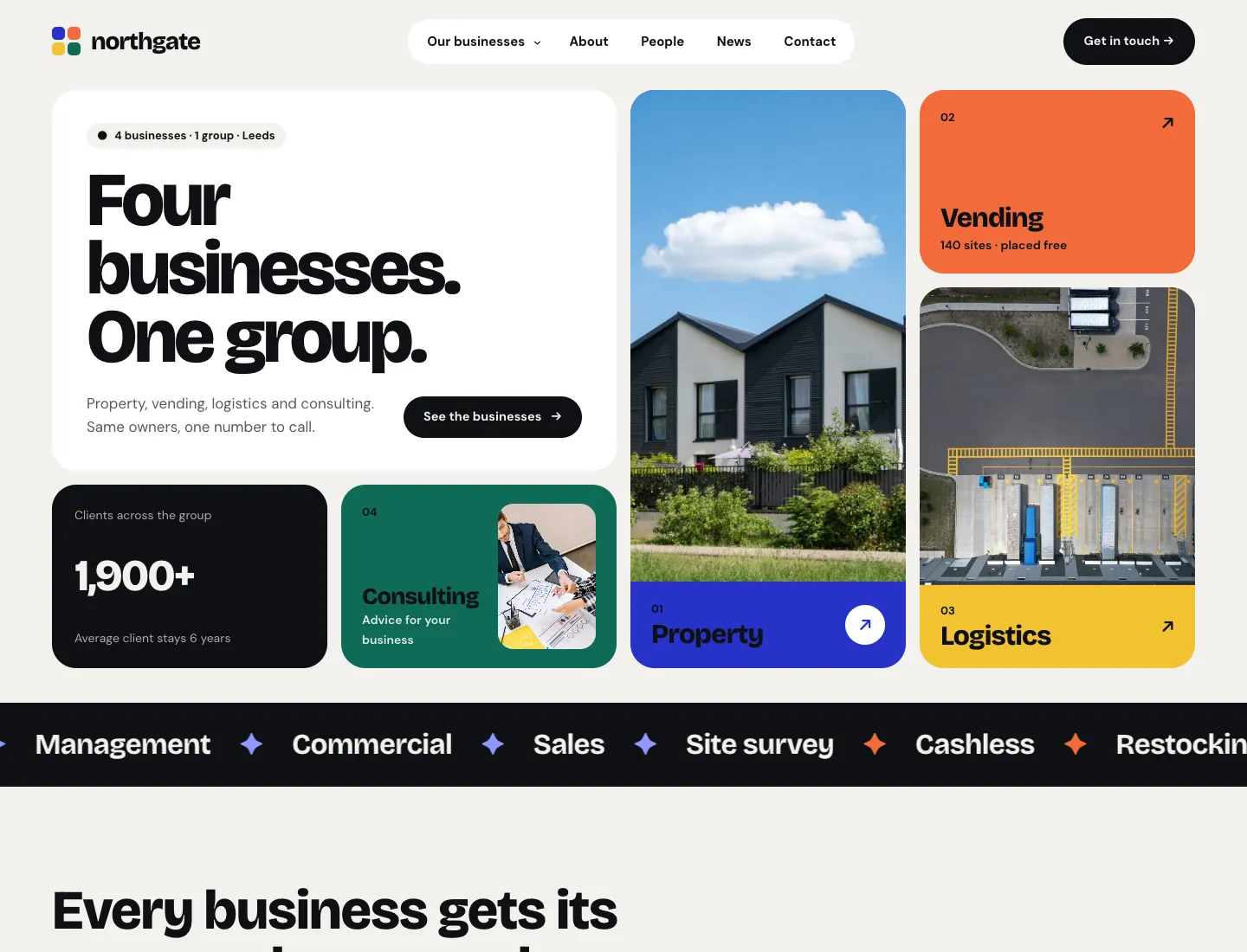 Group home page in the Mosaic design on desktop: “Four businesses. One group.” in a bento grid with colour cards for Property, Vending, Logistics and Consulting, a client count and a ticker of services